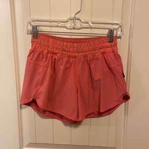 Lululemon Tracker 4in short. Size 6. Watermelon pink!